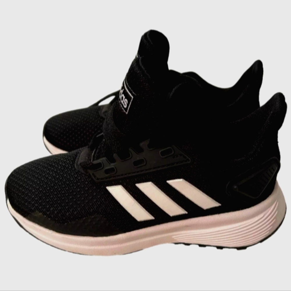 Elevate your child's casual style with these Adidas Cloudfoam Pure sneakers